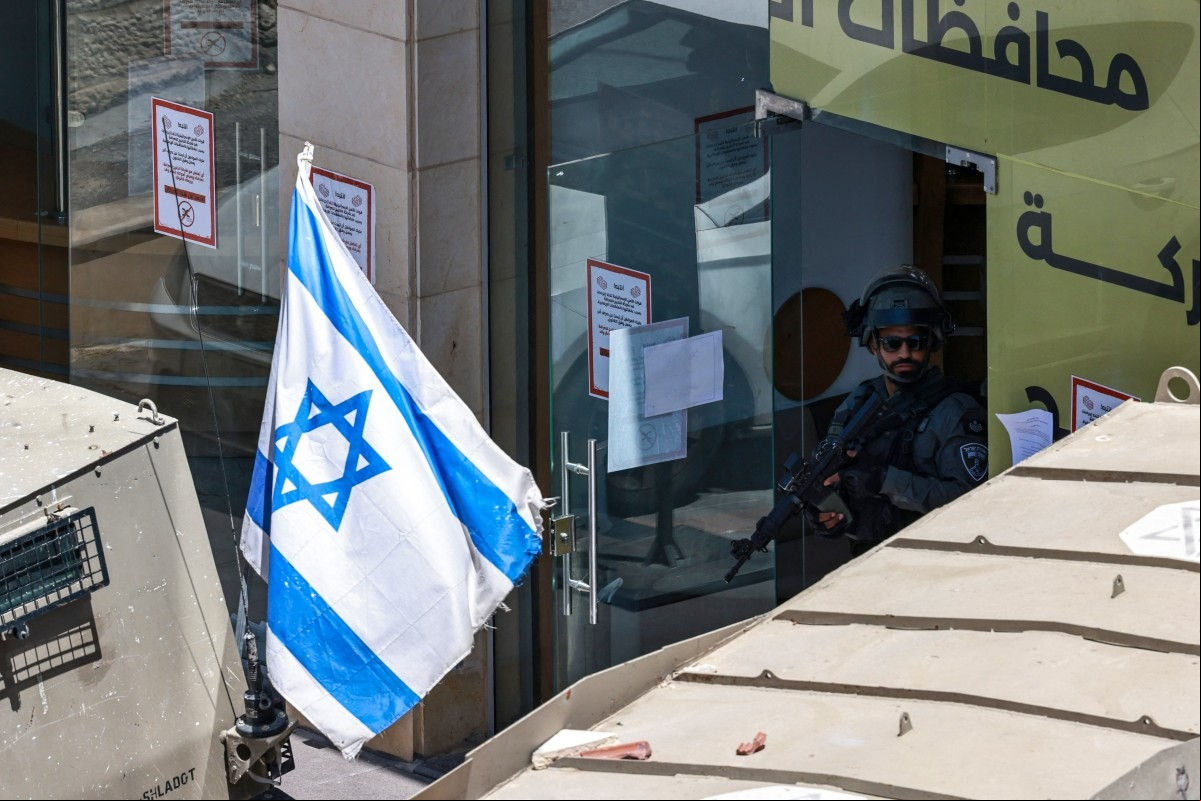 Governo federal brasileiro vem tecendo críticas à ofensiva militar de Israel na Faixa de Gaza e à expansão dos assentamentos israelenses em territórios palestinos (Zain JAAFAR / AFP)