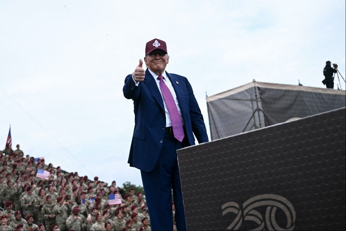 US President Donald Trump gives a thumbs up as he speaks at Fort Bragg, a US Army military installation, near Fayetteville, North Carolina, on June 10, 2025. (Photo by Brendan SMIALOWSKI / AFP)